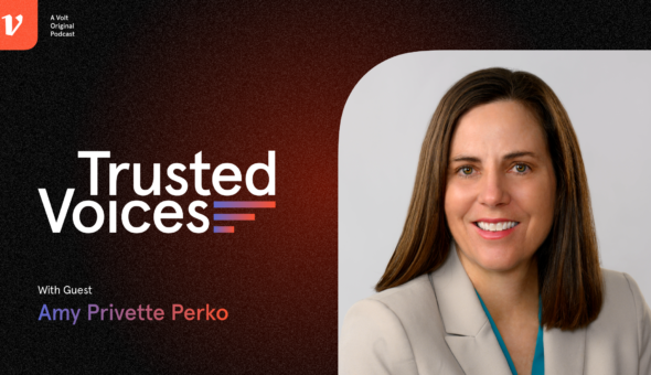 Graphic design showing a black-orange background next to a picture of a woman with light skin, brown hair, and a cream-colored suit jacket; the word Trusted Voices appears on the background; beneath that is the name 'Amy Privette Perko.'