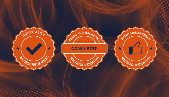 Three orange badges for completed microcredential programs.