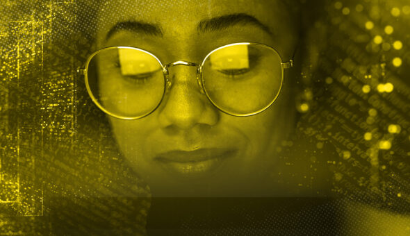 Is AI-driven search a game-changer for universities? article image, close-up portrait of a female wearing round glasses with a gold-tinted reflection, looking at a digital screen, golden bokeh background.